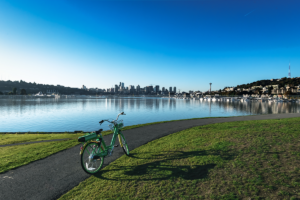 image of an electric bike on a road with view of Seattle