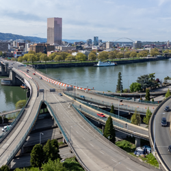 Highways, bridges, buildings and the Willamette River create this scenic aerial view of Portland, Oregon