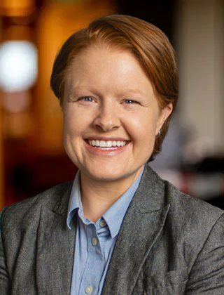 A professional headshot of Audrey Bell, an attorney at The Advocates Injury Attorneys in Seattle, WA.